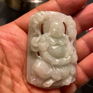 A Jade Buddha Pendant